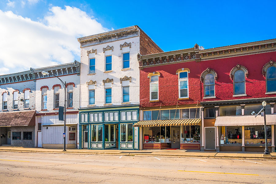 Business Insurance - Row of Stores in Small Town Main Street